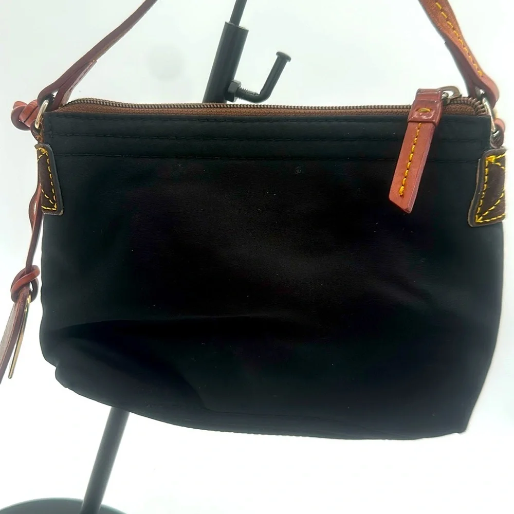 Dooney & Bourke Blue Nylon Crossbody Pouchette. Leather Strap & DB Tag